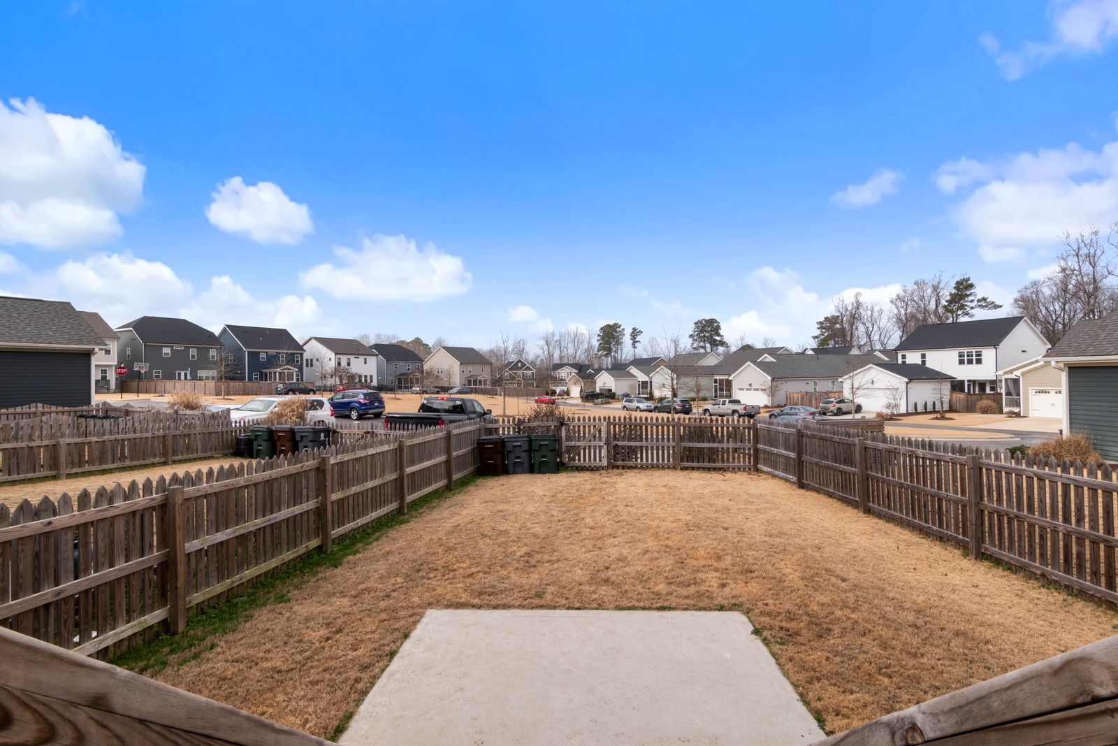 Wood privacy fences between houses in a suburban subdivision
